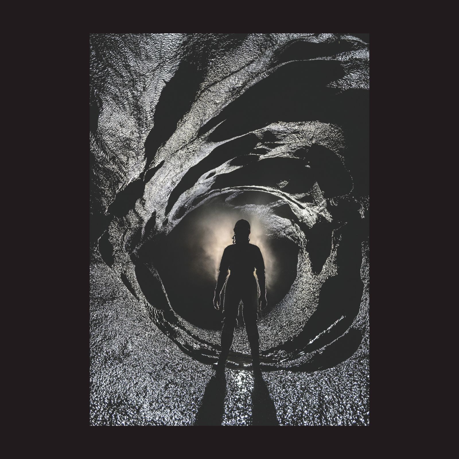 312 back cover: Nicola Bayley in Bakerloo Straight, Dan Yr Ogof. This image appears in our new Pot Trumps card game, raising money for the British Cave Rescue Council Photo: Andy Harp